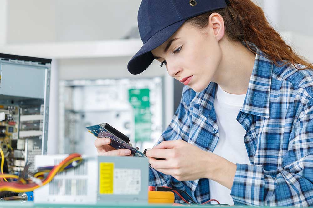 Computer Installation and Repair Technician Working