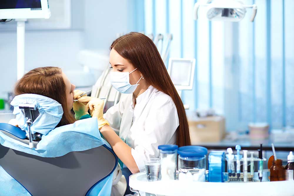 dental hygienist working