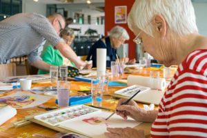 recreational therapist leading an art session