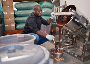 chocolate maker working in a chocolate factory